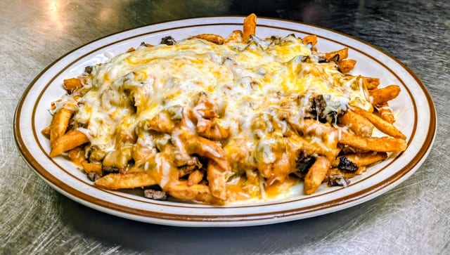 Asada Chile Cheese Fries.